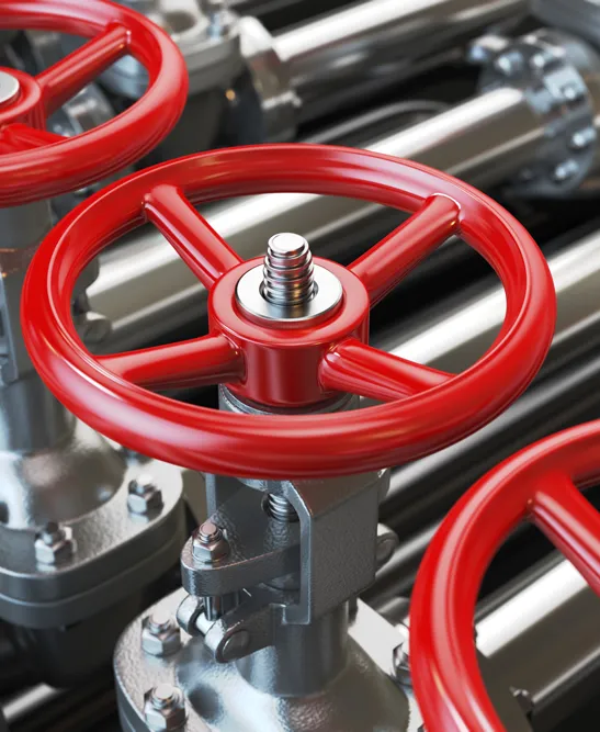 Red industrial valve handwheel with machined steel bar stock